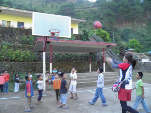 come morning, a bunch of kids started playing at the school basketball court, here's Doc playing a game (or attempting to) with them